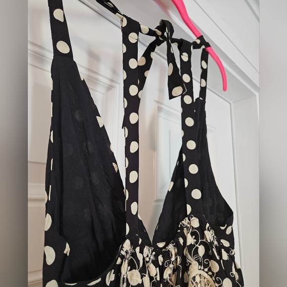 Free people top size XS. Black w cream Polkadots.          A - Picture 4 of 6